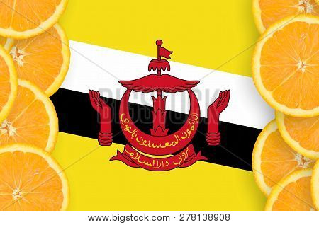 Brunei Darussalam Flag  In Citrus Fruit Slices Vertical Frame