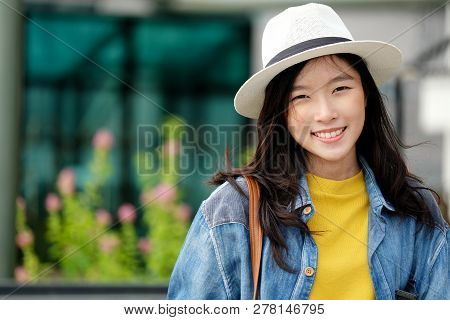 Young Asian Woman Portrait Smiling With Happiness At City Outdoors Background, Casual Lifesyle, Trav