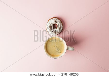 Flat Lay With Cup Of Coffee And Pink Donut Copy Space. Woman Day, 8 March. Pink Background. Woman An