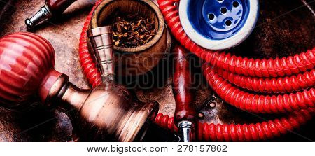 Smoking Hookah With Tobacco
