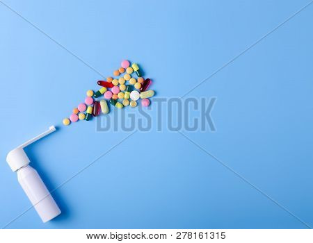 Pills Capsules Throat Spray Medicine Health On Blue Background Top View, Medical Pharmacy Concept