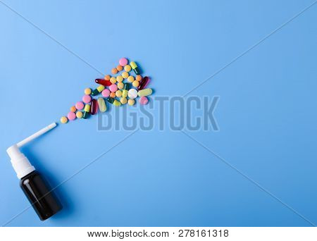 Pills Capsules Throat Spray Medicine Health On Blue Background Top View, Medical Pharmacy Concept