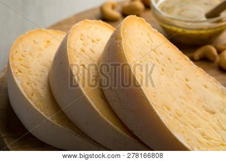 Slices of Belgian Passendale cheese close up for dessert