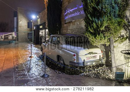 Amman, Jordan, December 07, 2018 : An Old White Limousine Stands At The Entrance Of The King Abdulla