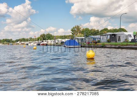 Loosdrecht, Netherlands - September 3 , 2017:  Caravans At The Recreation Center Mijnden On The Bank