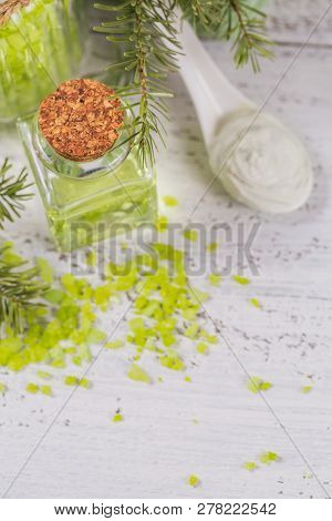Natural Cosmetic Oil, Sea Salt And Organic Facial Mask With Coniferous Extract On White Rustic Woode