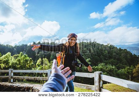 Couple Asians Travel Nature In The Holiday. Hold Hands Running Happy Enjoy Nature On The Mountain At