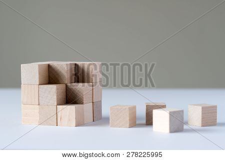 Wood Cubes To Complete A Bigger Square Block