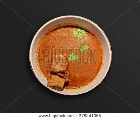 Soup Kharcho, Traditional Georgian Soup With Meat And Rice On Black Beackground Menu