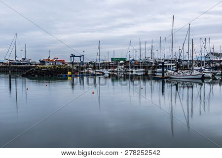 Carrickfergus Harbour With Boats And Reflection ,antrim,northern Ireland, Uk