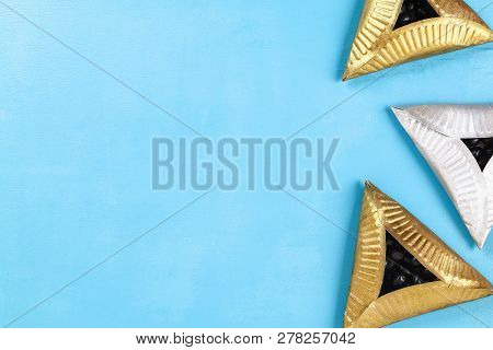 Purim. Diy Cookies Hamantaschen Of Cardboard Plates With Sweet Surprise Inside On Blue Background. G