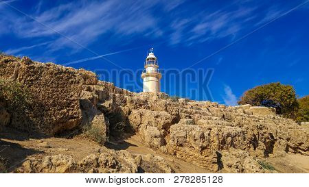 Ancient Ruins Of Kourion City Near Pathos And Limassol, Cyprus. Lighthouse Under The Blue Sky. Trave