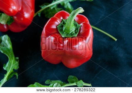 Black Food: Red Pepper And Arugula