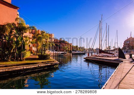 Port Of Sotogrande. Port, Sea, Yachts And Colorful Houses. Sotogrande, Costa Del Sol, Andalusia, Spa