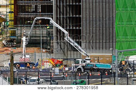 Gosford, New South Wales, Australia - December 18, 2018: Pumping Concrete With Safety Netting  Parti