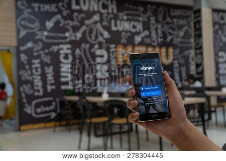 Chiang Mai, Thailand - Jan. 06,2019: Man Holding Huawei With Vimeo On Screen.  Vimeo Is A Video-shar