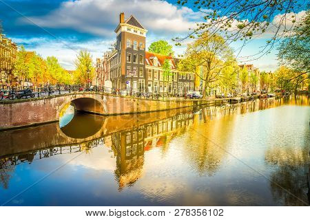 Dutch City Scenery With Canal And Mirror Reflections, Amstardam, Netherlands, Toned