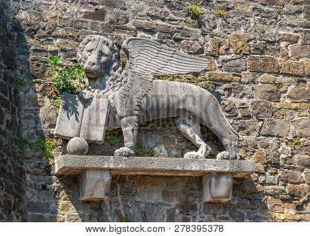 Lion Of Saint Mark On The Wall Of Historic Castle In Gorizia, Italy