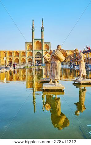 Yazd, Iran - October 18, 2017: The Bronze Sculptural Composition Of Water Carriers In Fountain Of Am