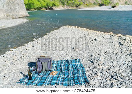 Picnic Setting On Stony River Bed By Fork In Waiau River Outside Tourist Destination Of Hanmer Sprin