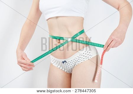 Woman Body After Weight Loss. Cropped Close Up Photo Of Fatless Slender Body Parts And Proportions W