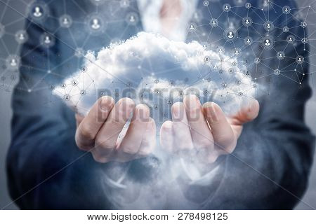 A Businesswoman Upper Half Is Standing And Holding A Cloud Surrounded By Wireless Connections At The