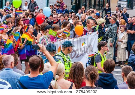 Vilnius, Lithuania - July 27, 2013: Pride Parade In Action. Crowd Of Watchers And Demonstrators With
