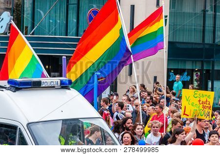 Vilnius, Lithuania - July 27, 2013: Pride Parade In Action. Crowd Of Watchers And Demonstrators With