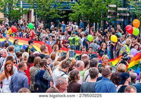 Vilnius, Lithuania - July 27, 2013: Pride Parade In Action. Crowd Of Watchers And Demonstrators With
