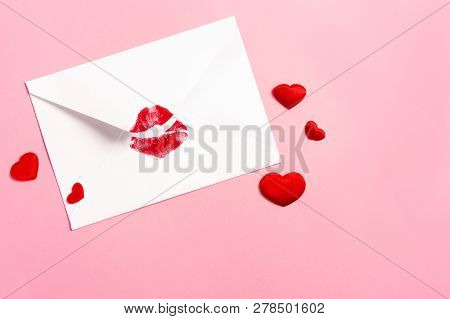 Valentines Day Background. Love Letter Concept. White Envelope With Red Lipstick Kis, And Red Hearts