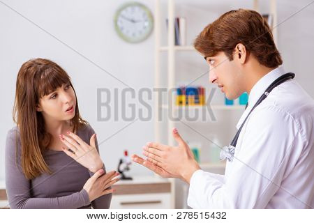 Deaf-mute female patient visiting young male doctor 
