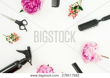 Hairdresser Styler Frame Concept With Spray, Scissors, Combs And Peonies Flowers On White Background