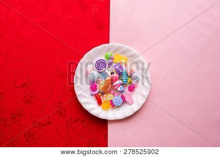 Candy Cane On White Plate With Pink And Red Tablecloth Texture Background, Valentine's Day Holiday C