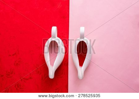 Cups Of Love On Pink And Red Tablecloth Texture Background, Valentine's Day Holiday Celebration.