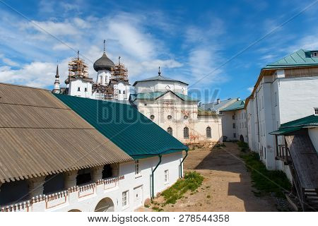 Solovki, Republic Of Karelia, Russia - June 27, 2018: View Of The Mill And The Church Of Philip In T
