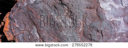 Hematite Ore Destroyed By Climatic Conditions. Banner For Design.