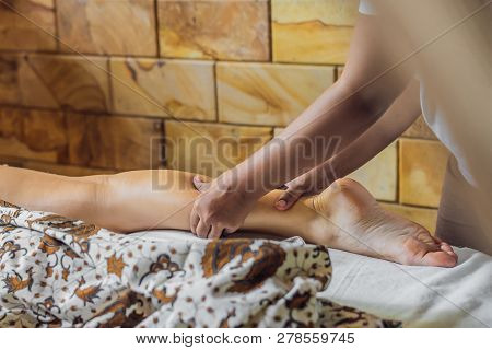 Total Relaxation. Beautiful Young Wwoman Get Balinese Or Thai Massage