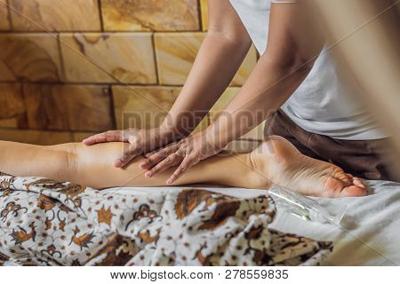 Total Relaxation. Beautiful Young Wwoman Get Balinese Or Thai Massage