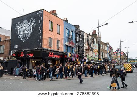 LONDON, UK - DECEMBER 30, 2018: Visitors at Camden High St. Camden Market and streets nearby are the fourth-most popular attraction in the city, attracting approximately 100,000 people each weekend