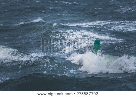 Green Buoy In Sea Water