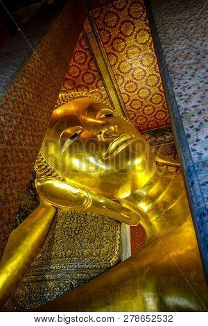 Reclining Buddha In Wat Pho Buddhist Temple, Bangkok, Thailand