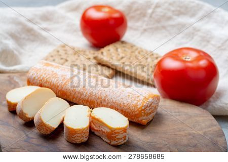 Fagotin Cheese With  Orange Coloured Rind Made From Cow Milk In Caves Of Maredsous Abbey, Belgium