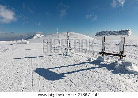 Trip Along The Krkonose Mountains Towards Snezka. Winter Ridges Of The Krkonose Mountains, In The Ba