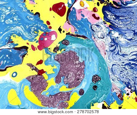 Abstract Marbling, Ebru Style Background With Waves And Splashes Of Blue, Yellow And Violet Colors. 