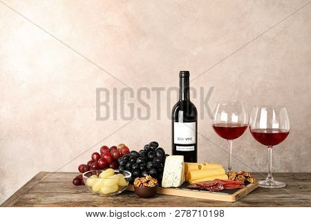 Composition With Wine And Snacks On Table. Space For Text