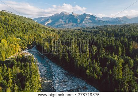 The Bialka River With Tatra Mountains In The Background