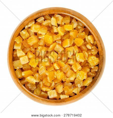 Candied Orange Peel In Wooden Bowl. Diced, Preserved And Crystallized Peel Of Oranges In Sugar Syrup
