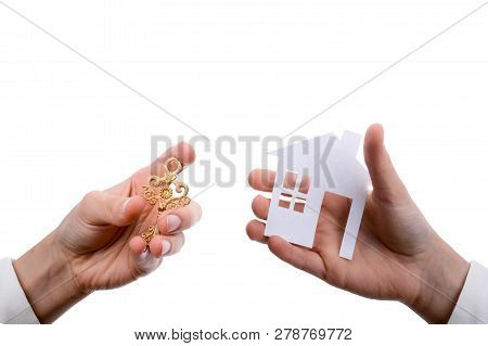 Hand Holding An Isolated Paper House With A White Background