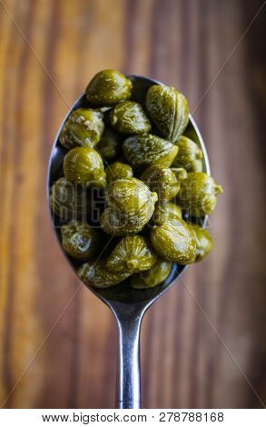 Edible Capers In Spoon Ready To Eat.