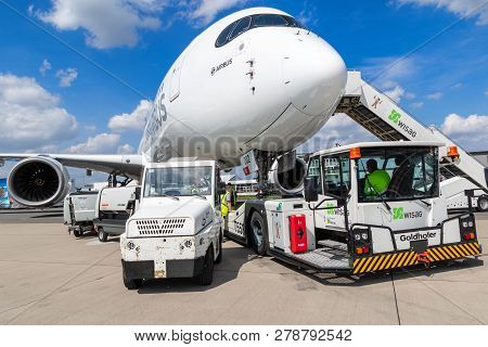 Berlin, Germany - Apr 27, 2018: New Modern Airbus A350 Xwb Passenger Jet Plane About To Be Towed By 